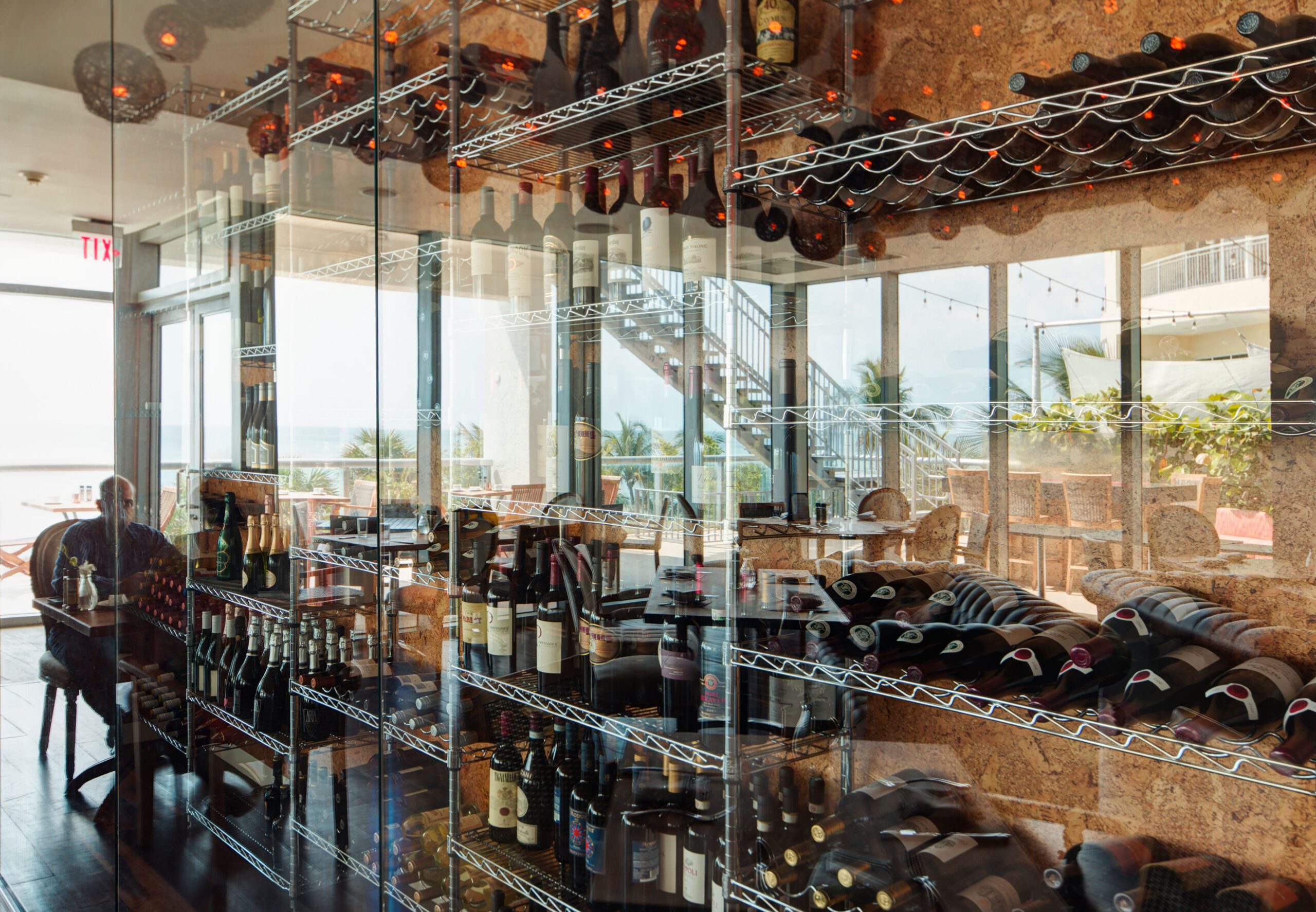 Wine bottles on shelves in restaurant Orlando Restaurants